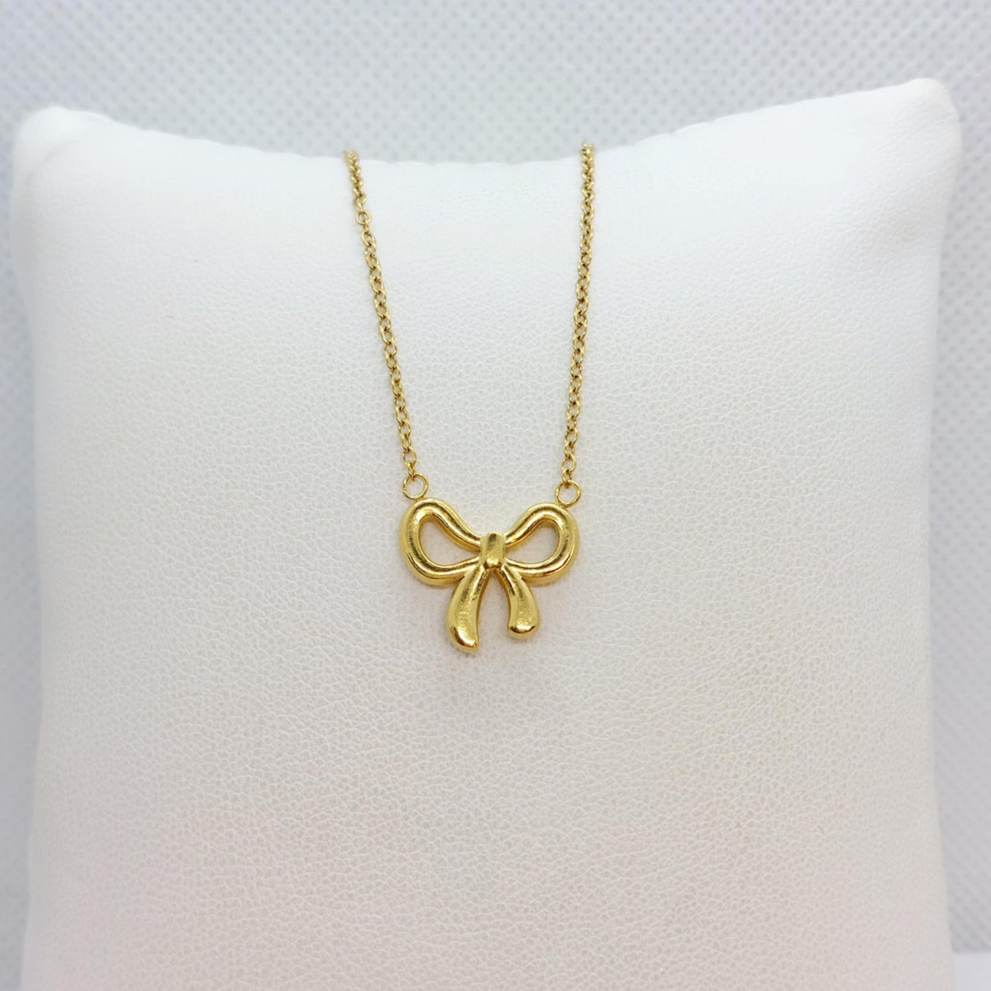 Infinity Bow Tie Pendant in Stainless Steel Gold Plated Chain Necklace