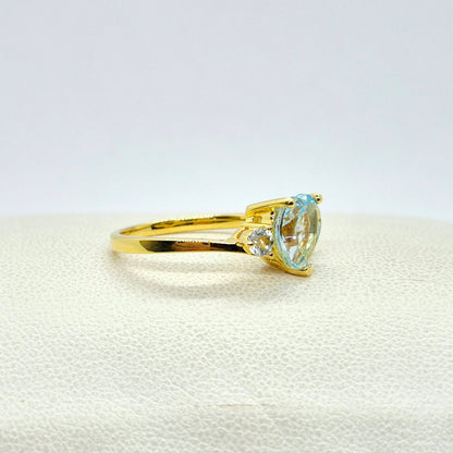 Natural Sky Blue Topaz Set in Gold Plated Stainless Steel