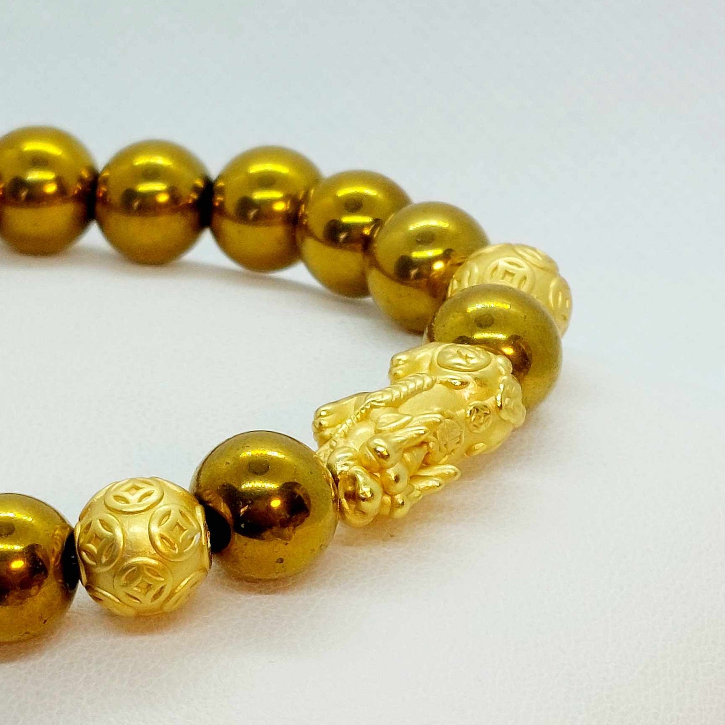 Natural Hematite Bracelet colored gold in 10mm Stones with Pixiu Feng Shui