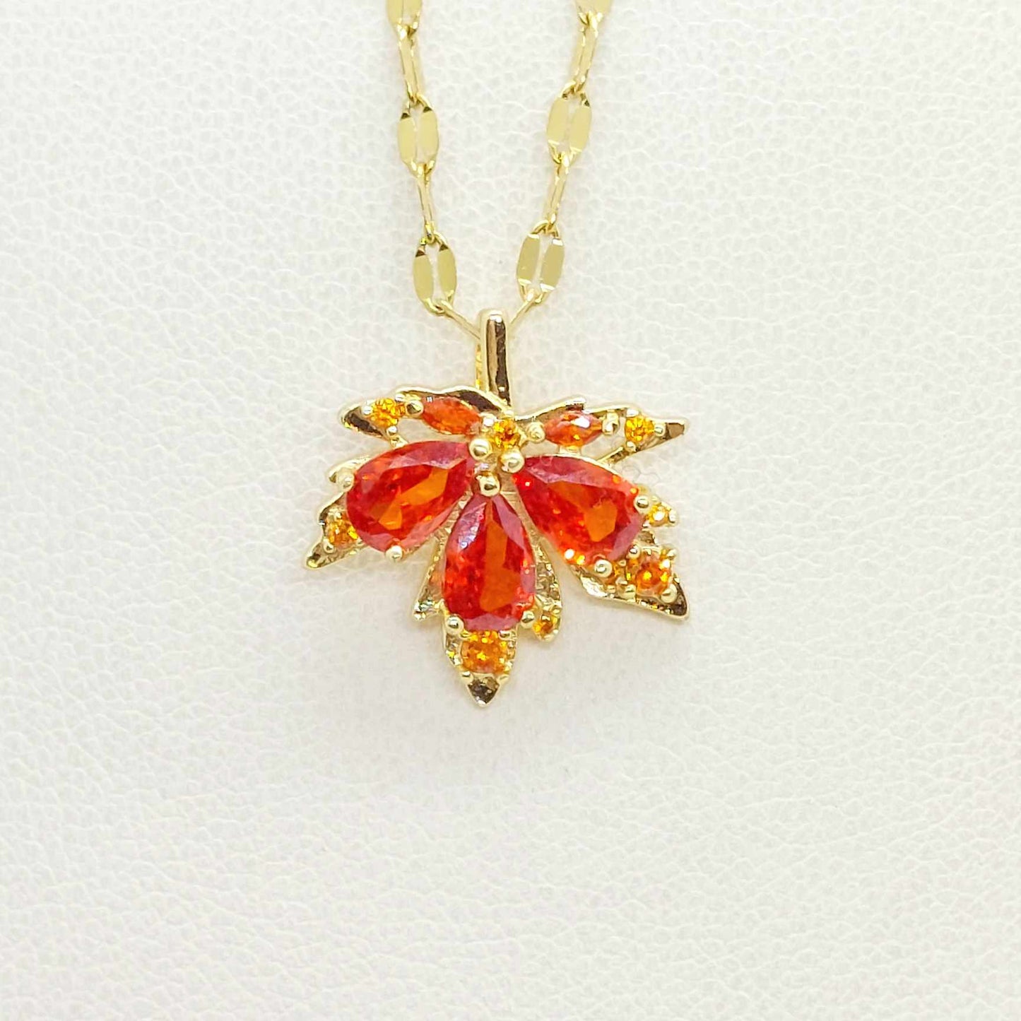 Maple Leaf Pendant in Red Zircon and Stainless Steel with Gold Plated Necklace Chain