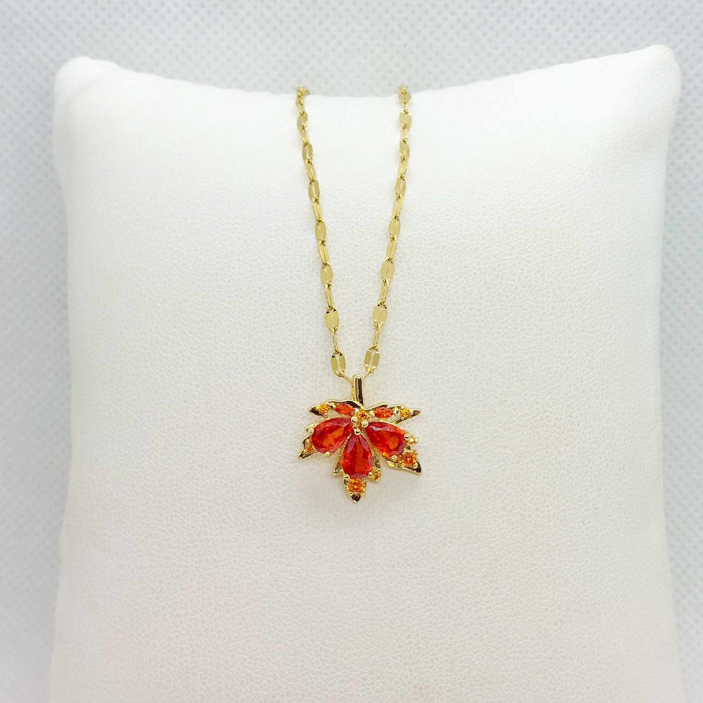 Maple Leaf Pendant in Red Zircon and Stainless Steel with Gold Plated Necklace Chain