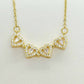 Four Hearts Pendant in Zircon and Stainless Steel with Gold Plated Necklace Chain