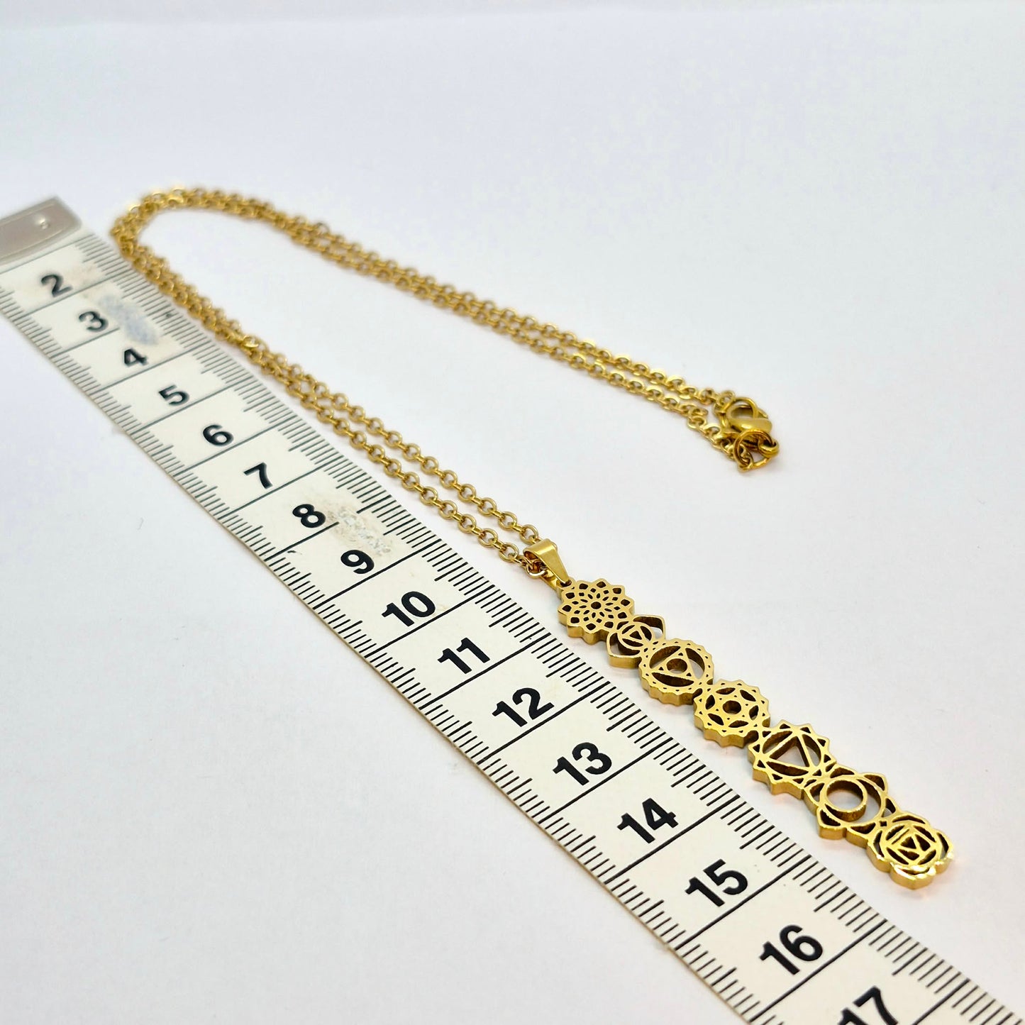 The 7 Chakra's Pendant with Chain Necklace in Gold Platted Stainless Steel