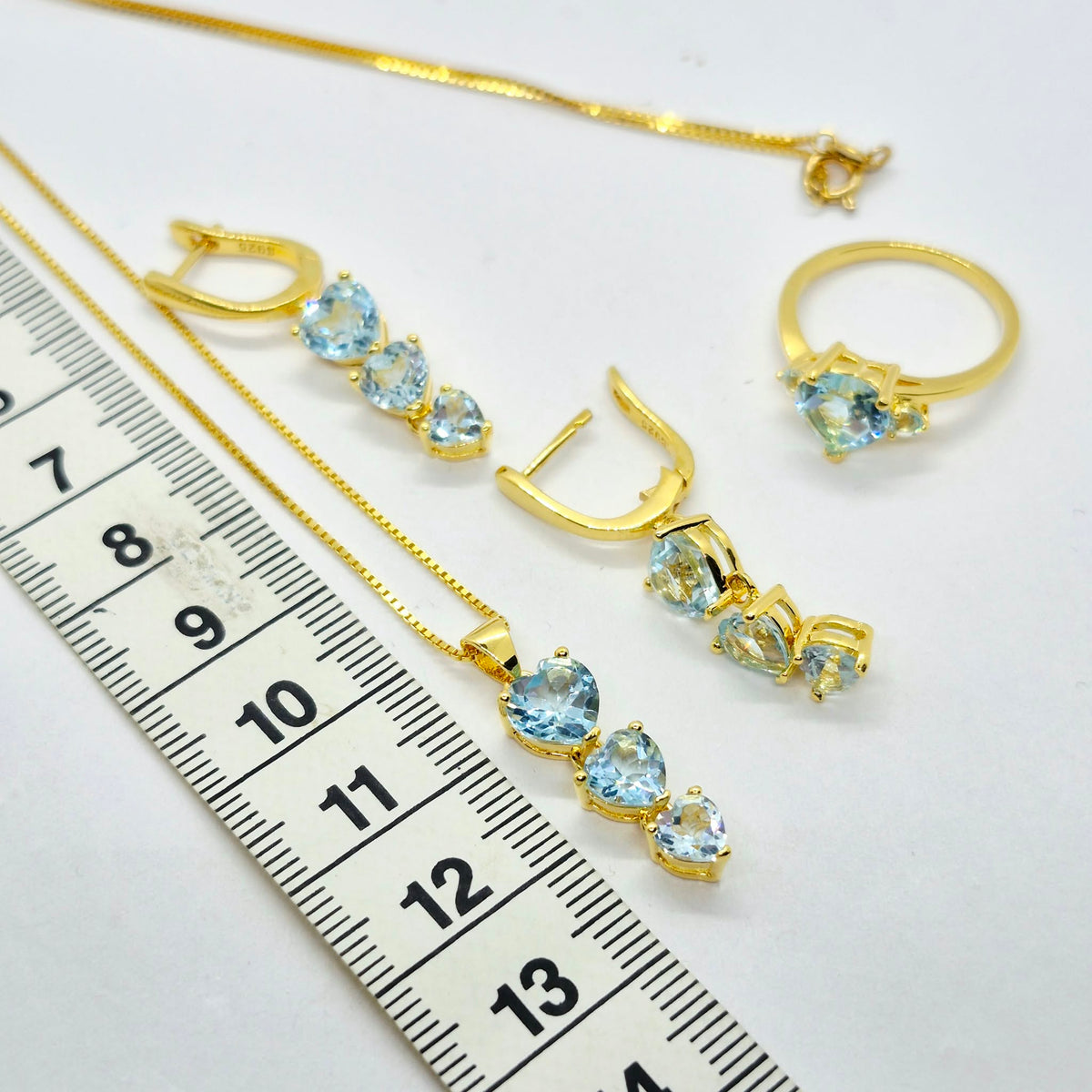 Natural Sky Blue Topaz Set in Gold Plated Stainless Steel