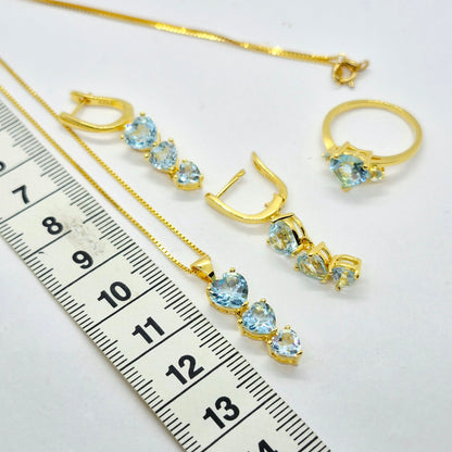 Natural Sky Blue Topaz Set in Gold Plated Stainless Steel