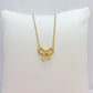 Infinity Bow Tie Pendant in Stainless Steel Gold Plated Chain Necklace