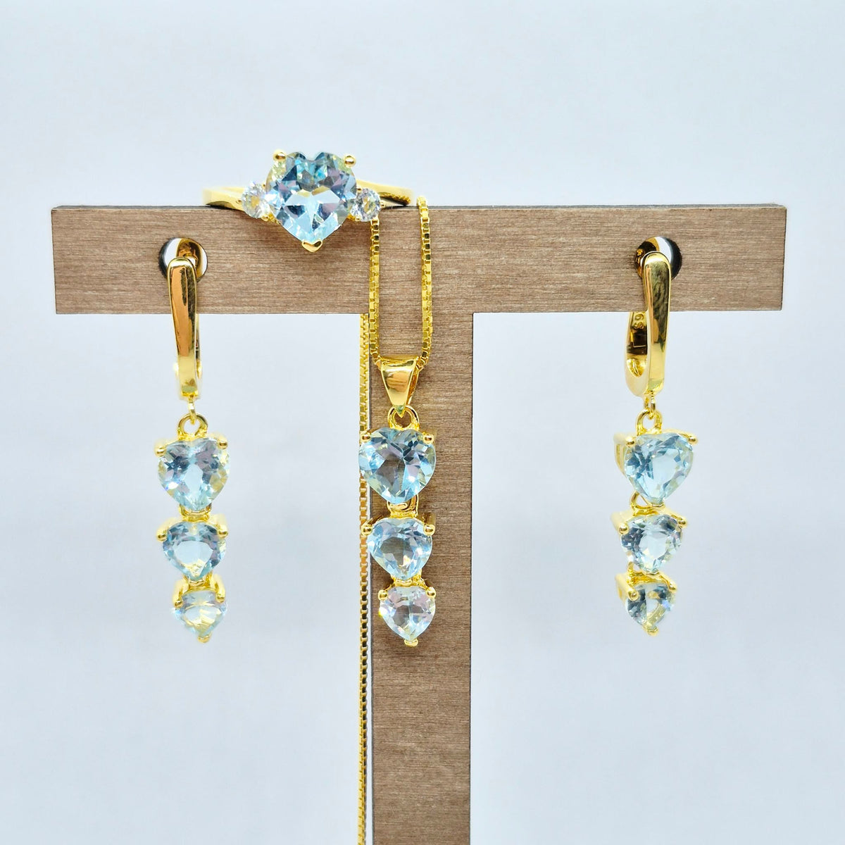 Natural Sky Blue Topaz Set in Gold Plated Stainless Steel