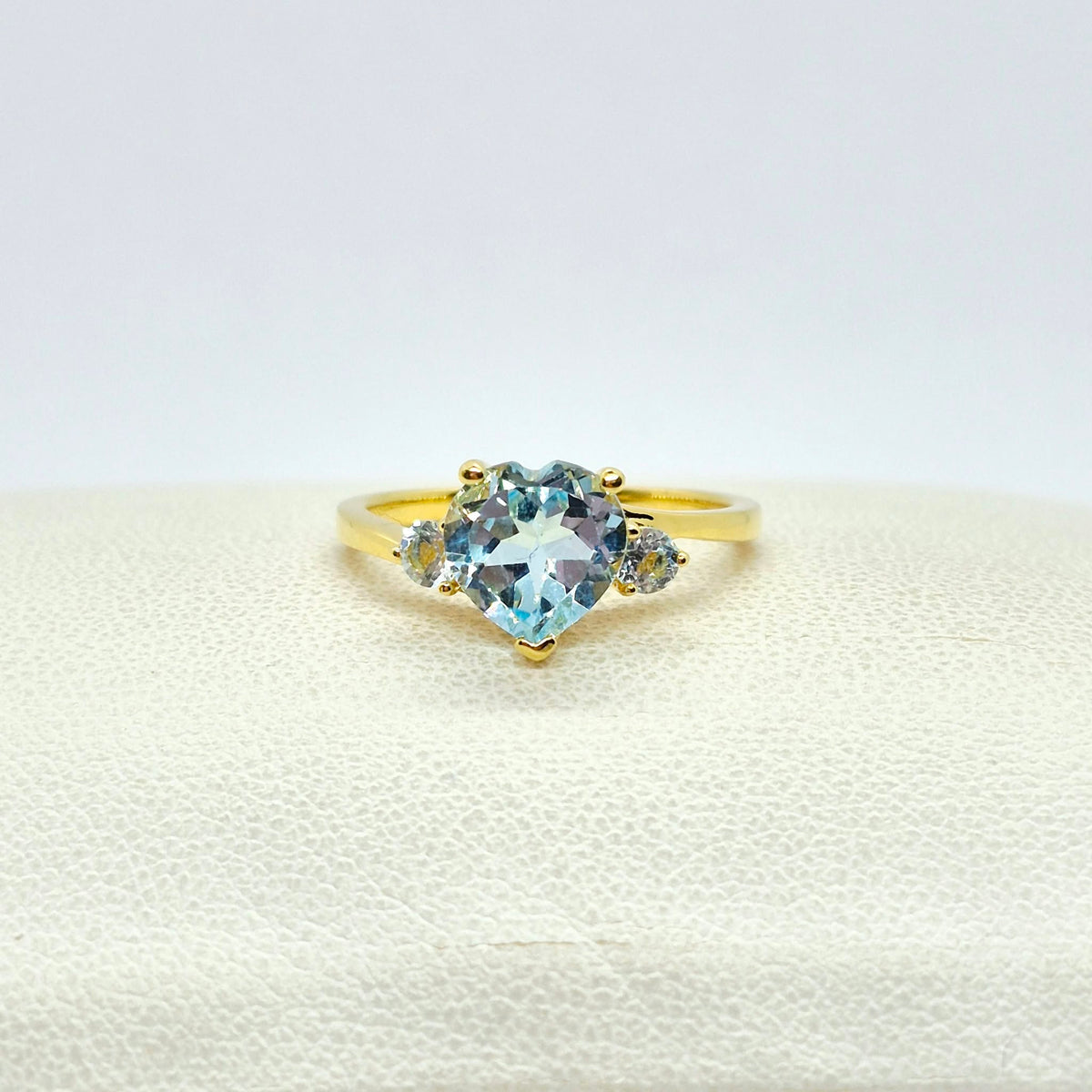 Natural Sky Blue Topaz Set in Gold Plated Stainless Steel