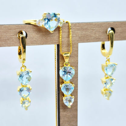 Natural Sky Blue Topaz Set in Gold Plated Stainless Steel