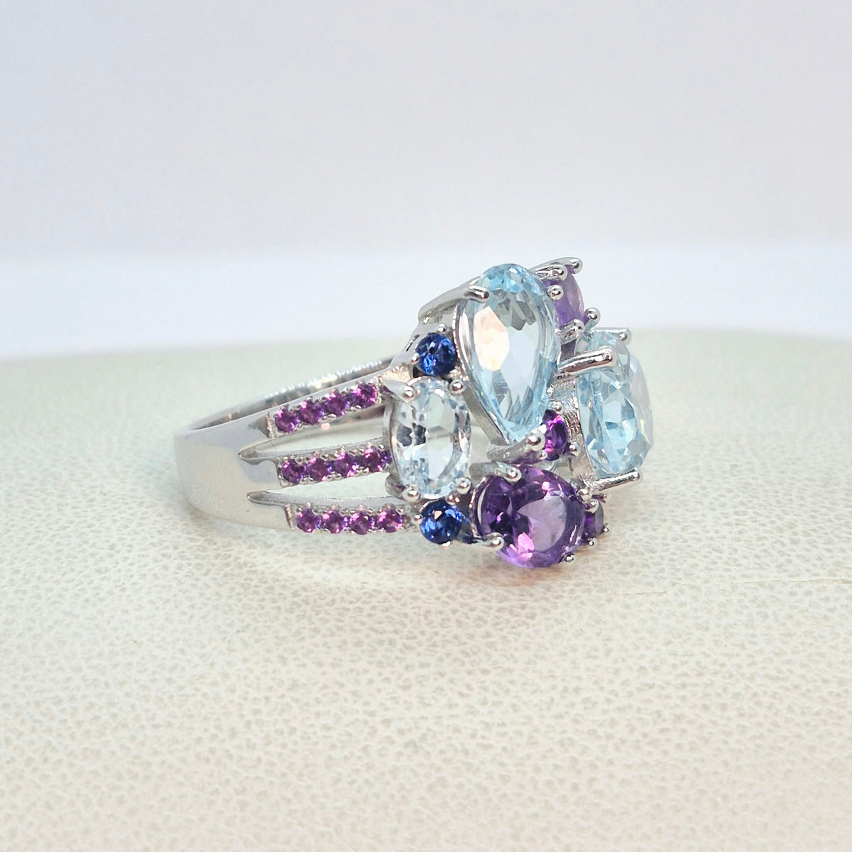 Natural Sky Blue Topaz and Amethyst Stone Ring in Sterling Silver with Nano Sapphire side stones