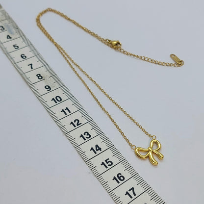 Infinity Bow Tie Pendant in Stainless Steel Gold Plated Chain Necklace