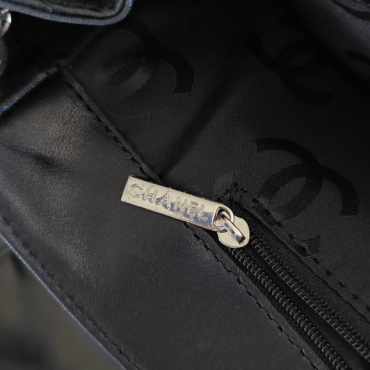 Pre-Loved Chanel Black ----------- Handbag